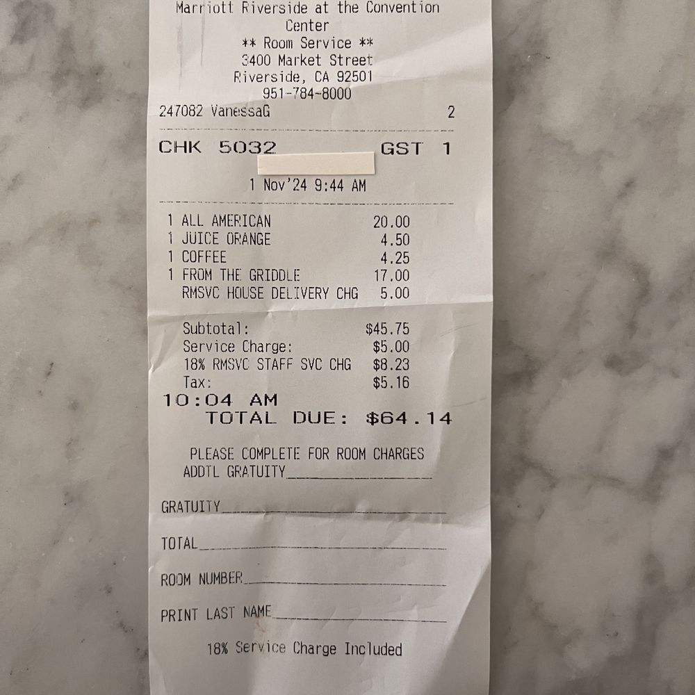Image of our room service receipt and extra charges for drinks Image of our room service receipt and extra charges for drinks