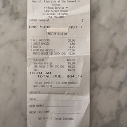 Image of our room service receipt and extra charges for drinks Image of our room service receipt and extra charges for drinks