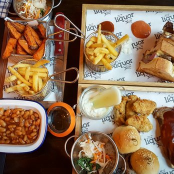 The Liquor Store - Meat Feast (£14.95) and Classic Philly Steak with fries (£9.95) and Spiced lemongrass sweet potatoes wedges with crème fraîche (£2.95) - Bars Near Me - Manchester, XGM The Liquor Store - Meat Feast (£14.95) and Classic Philly Steak with fries (£9.95) and Spiced lemongrass sweet potatoes wedges with crème fraîche (£2.95) - Bars Near Me - Manchester, XGM