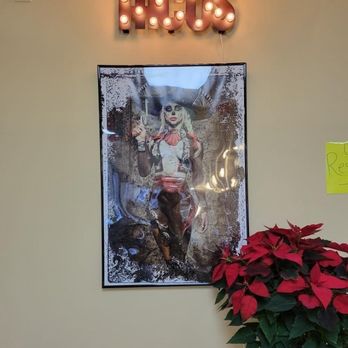 Tacos Del Barrio - Mexican art displayed throughout the restaurant. - Food Trucks Near Me