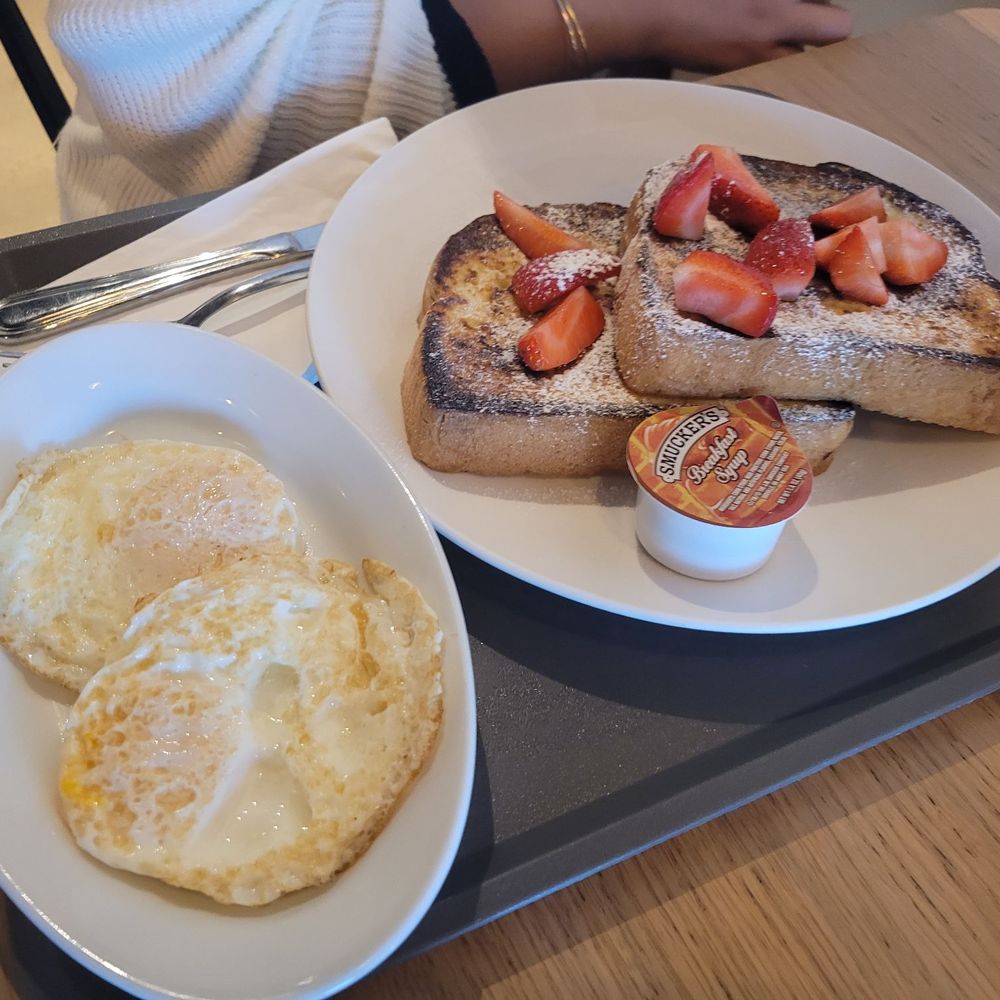 Moma’s Cafe - FRENCH TOAST: Brioche French toast and choice of syrups, finisher, and one topping. EGGS: Two over-easy eggs. - Cafes Near Me - Orlando, Florida Moma’s Cafe - FRENCH TOAST: Brioche French toast and choice of syrups, finisher, and one topping. EGGS: Two over-easy eggs. - Cafes Near Me - Orlando, Florida
