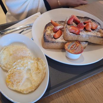 Moma’s Cafe - FRENCH TOAST: Brioche French toast and choice of syrups, finisher, and one topping. EGGS: Two over-easy eggs. - Cafes Near Me - Orlando, Florida Moma’s Cafe - FRENCH TOAST: Brioche French toast and choice of syrups, finisher, and one topping. EGGS: Two over-easy eggs. - Cafes Near Me - Orlando, Florida