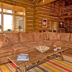 Tunnel Creek Lodge - The entire home is classically designed with "time gone by" log cabin features and old world teak furnishings throughout.