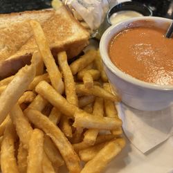 Brewster's Food and Spirits - Grilled cheese w pesto, fries and a cup of tomato soup.