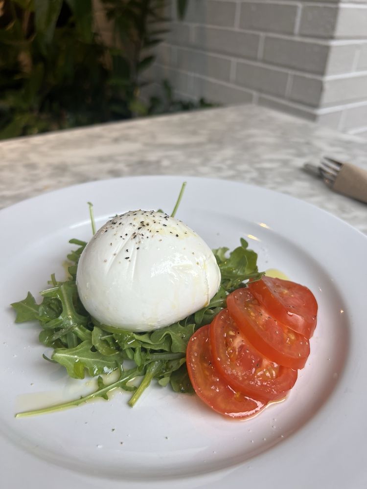 Un Posto Italiano Logo