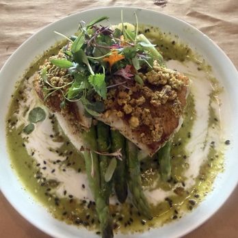 Rusty Bellies - Pistachio crusted Alaskan black cod over asparagus and jasmine rice with a Thai inspired sauce - Seafood Near Me - Tarpon Springs, Florida Rusty Bellies - Pistachio crusted Alaskan black cod over asparagus and jasmine rice with a Thai inspired sauce - Seafood Near Me - Tarpon Springs, Florida