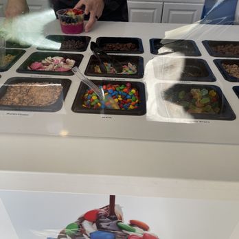 Yogurt Heaven II - a man standing in front of an ice cream counter - Ice Cream & Frozen Yogurt Near Me - San Diego, California Yogurt Heaven II - a man standing in front of an ice cream counter - Ice Cream & Frozen Yogurt Near Me - San Diego, California