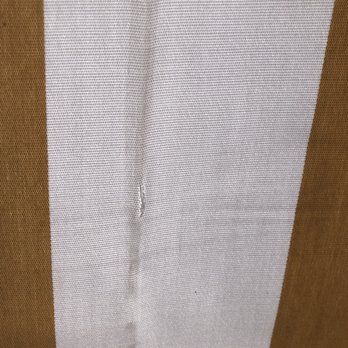 Awntech Corporation - Rip in crease of ugly grease filled awning - Awnings Near Me - Euless, Texas