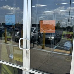 Dollar General - "Restroom break" sign with doors locked, yet there are two ladies inside shopping??