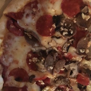 Venezia Italian Restaurant - Garlic on fleek! This is what garlic looks like on a pizza! - Italian Near Me - Advance, North Carolina