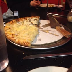 Brickhouse Pizza - Half gone....half Reuben half pepperoni, spicy sausage and mushrooms, I think I have a new favorite pizza.
