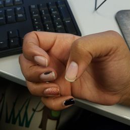 Nails done 10/28, photos taken 11/6. Polished started peeling November 4th. Right hand 3 nails lost the polish. Left hand peeled Nails done 10/28, photos taken 11/6. Polished started peeling November 4th. Right hand 3 nails lost the polish. Left hand peeled