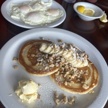 Shelly's Cafe - Banana Walnut Pancakes with 4 over easy eggs - Breakfast & Brunch Near Me - Tampa, Florida Shelly's Cafe - Banana Walnut Pancakes with 4 over easy eggs - Breakfast & Brunch Near Me - Tampa, Florida