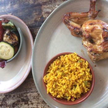 Nando's Peri-Peri - Quarter Chicken - breast and wing with Spicy Rice and Vegetable sides - Fast Food Near Me - Toronto, Ontario Nando's Peri-Peri - Quarter Chicken - breast and wing with Spicy Rice and Vegetable sides - Fast Food Near Me - Toronto, Ontario