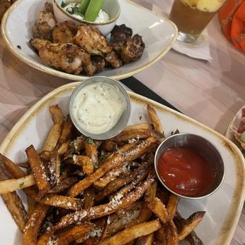 Monkeypod Kitchen - Greek chicken wings and truffle fries - Hawaiian Near Me - Kapolei, Hawaii Monkeypod Kitchen - Greek chicken wings and truffle fries - Hawaiian Near Me - Kapolei, Hawaii
