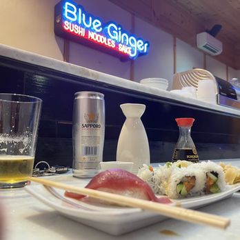 Blue Ginger Sushi & Noodles - a plate of sushi and chopsticks - Sushi Bars Near Me - Mill Spring, North Carolina Blue Ginger Sushi & Noodles - a plate of sushi and chopsticks - Sushi Bars Near Me - Mill Spring, North Carolina