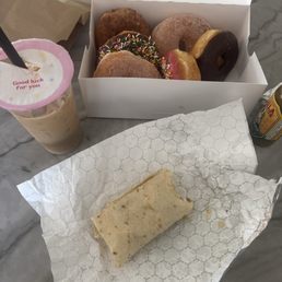 Iced coconut latte, bacon breakfast burrito, half dozen Iced coconut latte, bacon breakfast burrito, half dozen