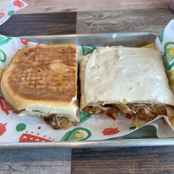 El Tejano Latin Cuisine Express - Half a Cuban sandwich and half a Chicken chimichanga. - Latin American Near Me - Augusta, Georgia El Tejano Latin Cuisine Express - Half a Cuban sandwich and half a Chicken chimichanga. - Latin American Near Me - Augusta, Georgia