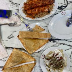 Main Bakhtar Halal Kabab - Bolani, dumplings, and chicken kabob platter
