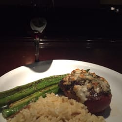 Richard's Prime Rib and Seafood - Black peppercorn crusted Filet Mignon topped with blue cheese