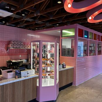 Voodoo Doughnut - Display case and checkout - Bakeries Near Me - Bellevue, Washington Voodoo Doughnut - Display case and checkout - Bakeries Near Me - Bellevue, Washington