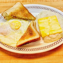 Waffle House - Pork Chop breakfast with grits and eggs