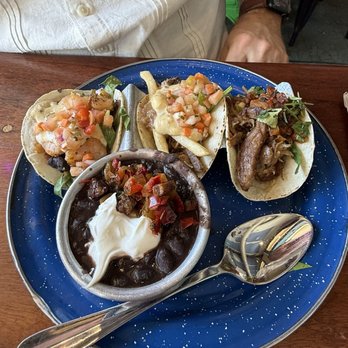 The Rum House - Taco trio with black beans. The debris taco in the middle was a highlight. - Caribbean Near Me - New Orleans, Louisiana The Rum House - Taco trio with black beans. The debris taco in the middle was a highlight. - Caribbean Near Me - New Orleans, Louisiana