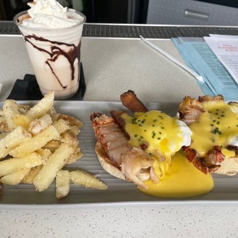 The Naughty Fox - Food: Lobster and Pork Belly Island Bennie with Fries Drink: Buffalo Milk (Vodka and Kahlua Mixed Drink) - New American Near Me - Avalon, California