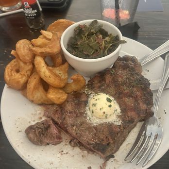 Latitude Seafood - Richmond - Ribeye steak with fries and collard greens - Seafood Near Me - Richmond, Virginia Latitude Seafood - Richmond - Ribeye steak with fries and collard greens - Seafood Near Me - Richmond, Virginia
