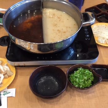 Nabeya Maido - left is maido soup base & right is paitan - Japanese Near Me - Honolulu, Hawaii Nabeya Maido - left is maido soup base & right is paitan - Japanese Near Me - Honolulu, Hawaii