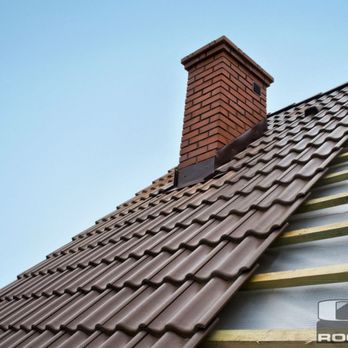 C&J Roofing - a view of a roof with a chimney - Roofing Near Me - Chambersburg, Pennsylvania C&J Roofing - a view of a roof with a chimney - Roofing Near Me - Chambersburg, Pennsylvania