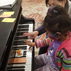 Suzuki Preschool of Newton - Suzuki Preschool student's piano lesson.