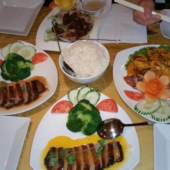 Present Restaurant - Clockwise : cow on field, chicken garlic lemon grass, duck  orange sauce, duck tamarind sauce - Vietnamese Near Me - Falls Church, Virginia