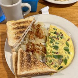 Infinite Diner & Restaurant - Cheese, Bacon, and Spinach Omlette with potatoes and toast.