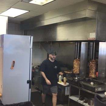 The Gyro Co - This is the beautiful rotisserie area where they shave the exceptionally season pork and chicken that they stuff the YIRO PITA with! YUM!!! - Greek Near Me - Plymouth, Massachusetts The Gyro Co - This is the beautiful rotisserie area where they shave the exceptionally season pork and chicken that they stuff the YIRO PITA with! YUM!!! - Greek Near Me - Plymouth, Massachusetts