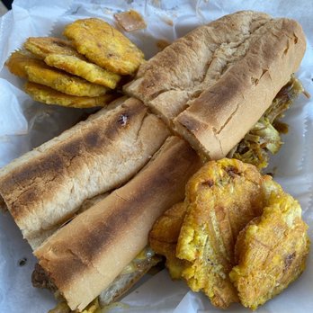 Coqui - Tri-pleta sandwich with tostones - Puerto Rican Near Me - Sanford, Florida