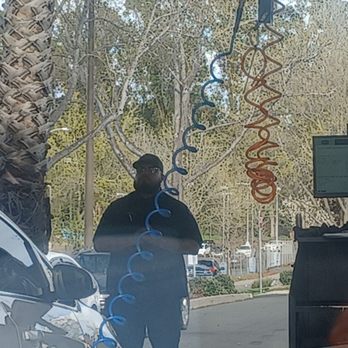 Oil Changers - Carlos, trying to stay away from the camera - Oil Change Stations Near Me - Vallejo, California