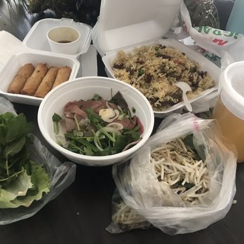 Pho Saigon Express - The house rice, order of large pho (#16) - they only give you one choice for take out so it's a large. An order of 6 egg rolls. Yum - Vietnamese Near Me - Escondido, California
