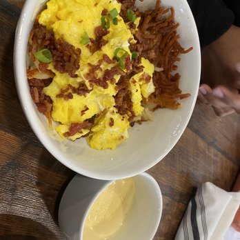 Spoke & Hub - Hashbrown bowl with choice of meat (bacon) and Pepper Jack queso on the side - Breakfast & Brunch Near Me - Baton Rouge, Louisiana