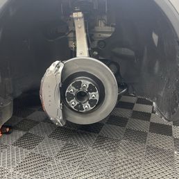 Painted Caliper cover to match body paint. Painted rotors. Painted Caliper cover to match body paint. Painted rotors.