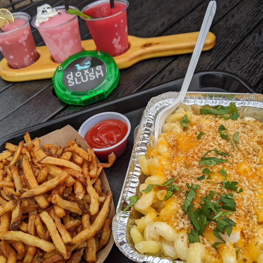 Doxie Slush - Lobster Mac and cheese, a side of fries, and a wine slushies flute - Seafood Near Me - Hermann, Missouri Doxie Slush - Lobster Mac and cheese, a side of fries, and a wine slushies flute - Seafood Near Me - Hermann, Missouri