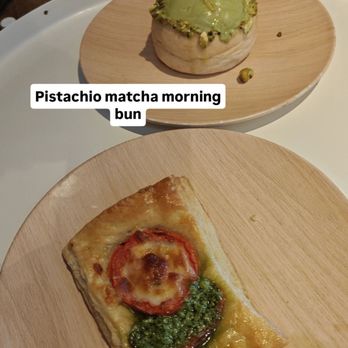 Cafe Leo - Pistachio matcha morning bun pictured on top, warm pesto tomato mozzarella turnover on bottom. - Cafes Near Me - Woodland Park, Colorado Cafe Leo - Pistachio matcha morning bun pictured on top, warm pesto tomato mozzarella turnover on bottom. - Cafes Near Me - Woodland Park, Colorado