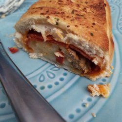 Tom's Market - Epic sausage and pepperoni calzone