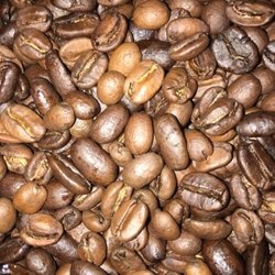 Black Powder Coffee - Fresh roasted coffee. In this case, roasted to city roast (light to medium) while changing the speed to push thru unique flavor.