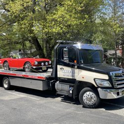 Xxcell Towing - Classic beauty on the move -- 1990 Alfa Romeo Spider Graduate transported with care and precision.