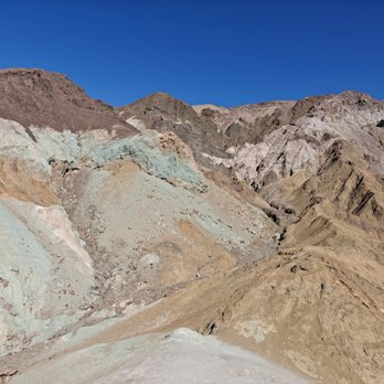 Artist's Palette - Artist's Palette. The colorful display comes from volcanic deposits containing various compounds such as chlorite and iron oxides. - Hiking Near Me - Death Valley, California Artist's Palette - Artist's Palette. The colorful display comes from volcanic deposits containing various compounds such as chlorite and iron oxides. - Hiking Near Me - Death Valley, California