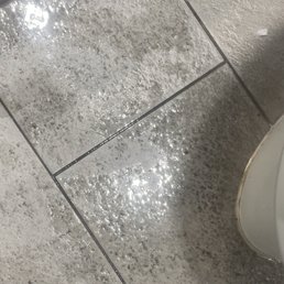 Soapy water by all the toilets Soapy water by all the toilets