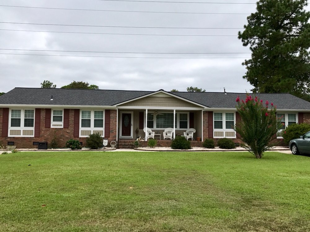 Slide of The Red Shirt Guys Roofing