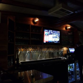 Bar 236 - a man standing in front of a television - Bars Near Me - Los Angeles, California Bar 236 - a man standing in front of a television - Bars Near Me - Los Angeles, California