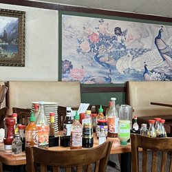 Eric's Asian Cafe - Random condiments table. Some are expired